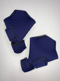 A pair of Birdy Bootie grey gloves with a number on them.