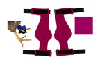 Two magenta braces with black straps on a white background. To the left is a small part of a bird's leg wearing a blue Birdy Bootie (Made in USA), designed for injured feet.