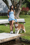 Woman with Dog (Husky-like) on Dock using Crazy K Farm Waterproof Leash. Dog Leash for Outdoor Adventures.