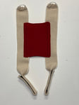 A pair of red and white Birdy Bra Crop Supporters on a white surface, designed as a chest protector.