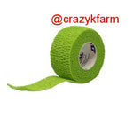 A roll of green Vet Wrap with the word "crazy farm" on it.