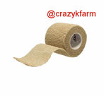 A roll of Vet Wrap with the word crazyfarm on it, perfect for pet first aid.