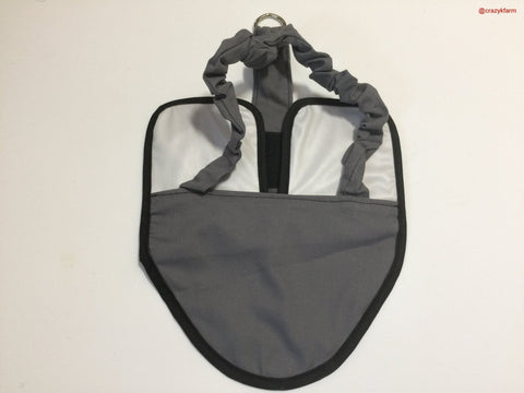 A CLEARANCE Hen Holster bird diaper/harness with permanent liner with a handle on it.